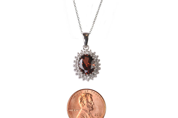 Sterling Silver Garnet and Diamond Necklace (.01ct) Oval Pendant Necklace - Jewelryland.com