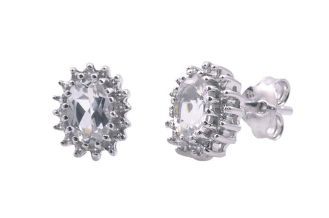 Sterling Silver White Topaz & Diamond Stud Earrings Oval .03 ct, I-J, I2 - Jewelryland.com