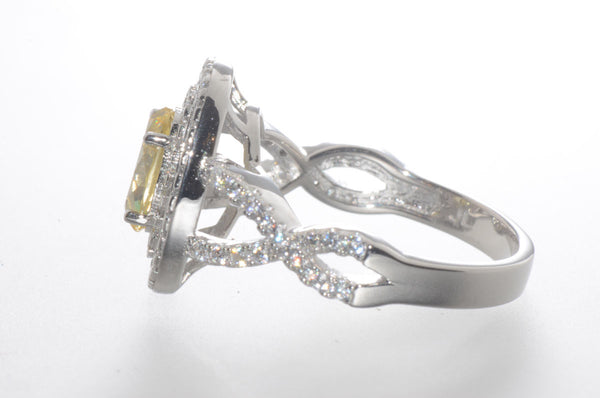 Sterling Silver Canary Yellow Oval Designer Cubic Zirconia Ring - Jewelryland.com