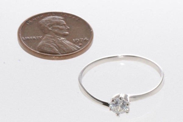 Sterling Silver Cubic Zirconia Ring 4mm 6 prong Round Clear AAA CZ with rhodium - Jewelryland.com