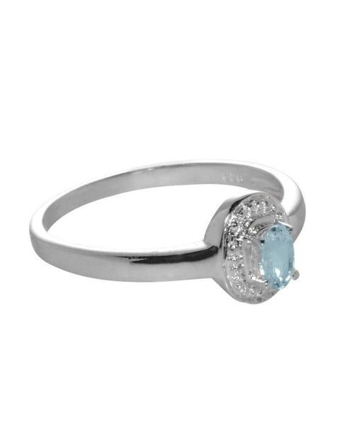 Sterling Silver Diamond Ring .01ct with Blue Topaz 3mm x 5mm Oval Gemstone - Jewelryland.com