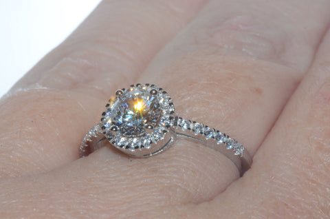 Sterling Silver Cubic Zirconia Ring 6mm Round Center Stone with Accent Stones - Jewelryland.com