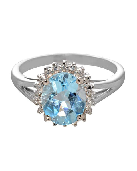 Sterling Silver Blue Topaz and Diamond Ring .01 ct, I-J, I2-I3 - Jewelryland.com