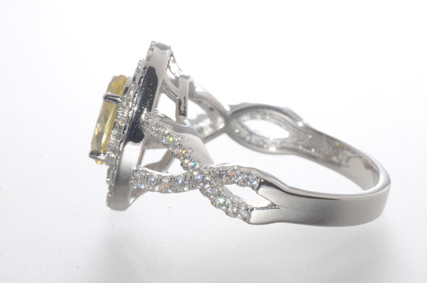 Sterling Silver Canary Yellow Oval Designer Cubic Zirconia Ring - Jewelryland.com
