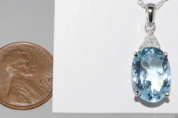 925 Sterling Silver 7ct Blue Topaz and .003ct Diamond Necklace - Jewelryland.com