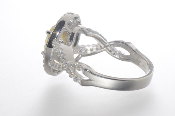 Sterling Silver Canary Yellow Oval Designer Cubic Zirconia Ring - Jewelryland.com