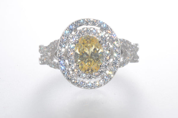 Sterling Silver Canary Yellow Oval Designer Cubic Zirconia Ring - Jewelryland.com