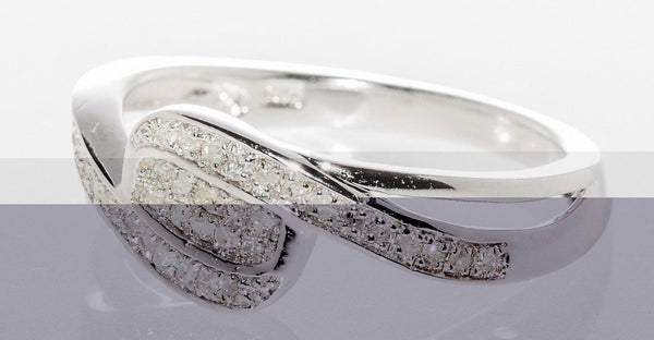 .925 Sterling Silver Swoosh Design Diamond Ring - .13ct, Size 7 - Jewelryland.com