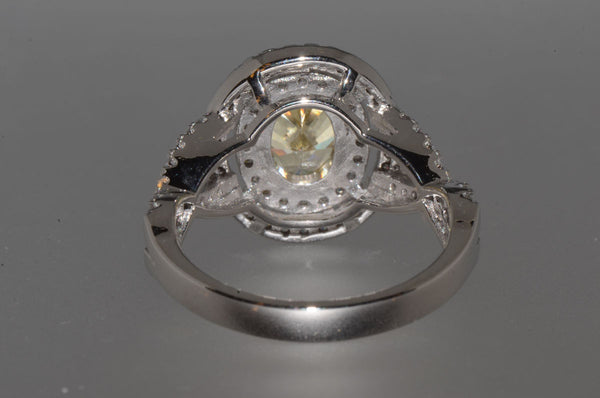 Sterling Silver Canary Yellow Oval Designer Cubic Zirconia Ring - Jewelryland.com