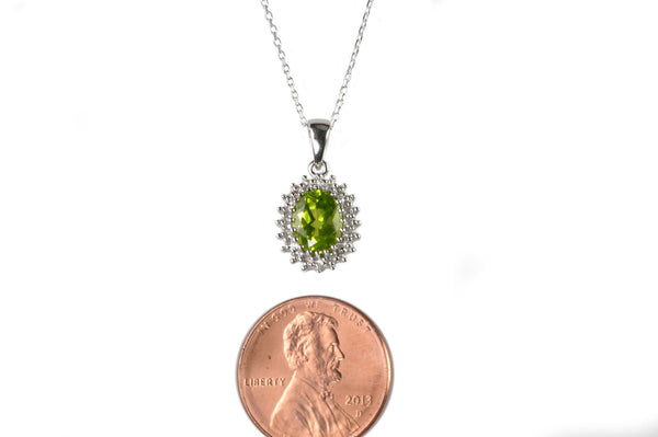 Sterling Silver Peridot and Diamond Necklace (.01ct) Oval Pendant Necklace - Jewelryland.com