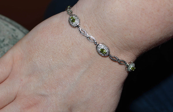 925 Sterling Silver Peridot & .01ct Diamond Bracelet 7.5" - Jewelryland.com